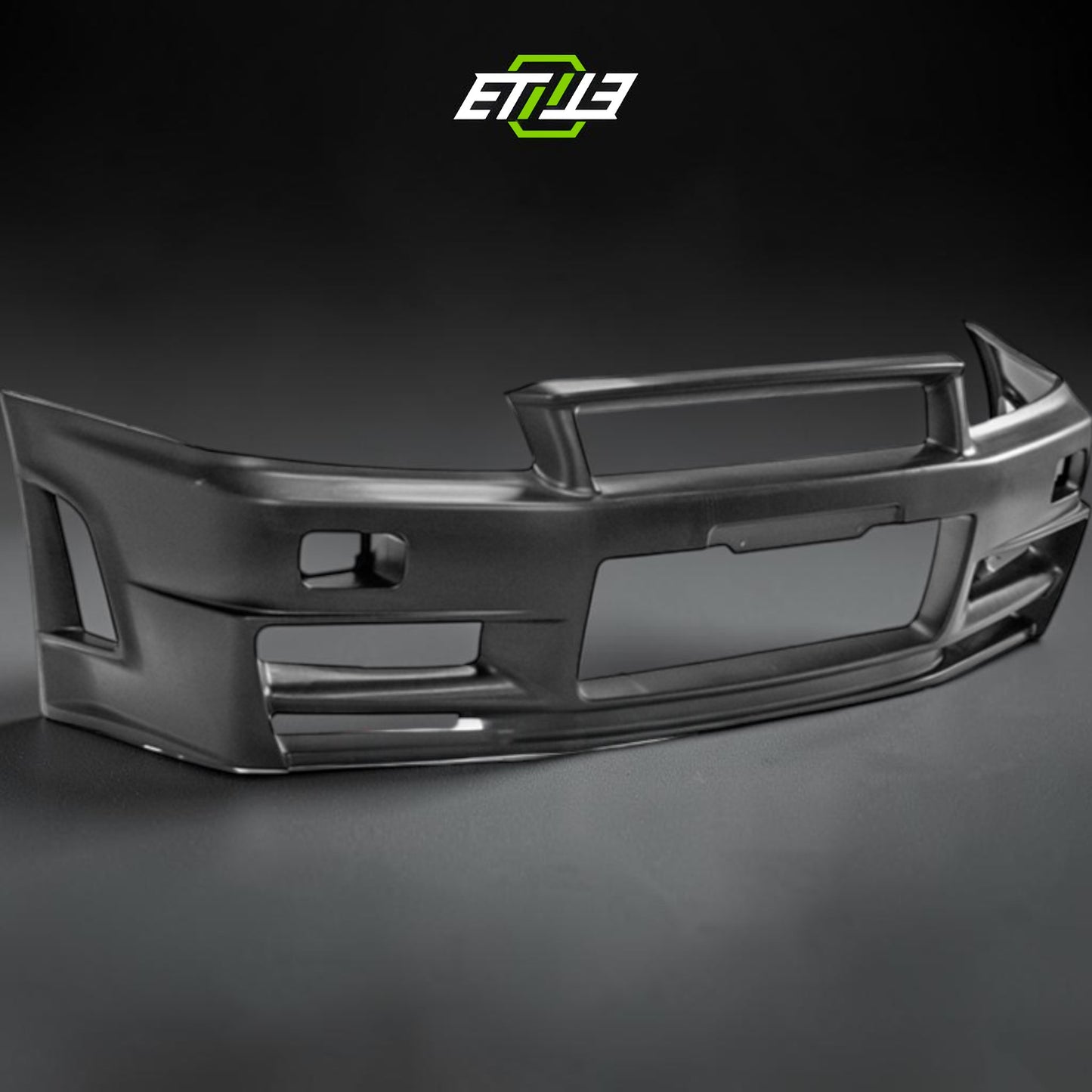 R34 GTR NI Z-Tune Style Front Bumper | SKU: R34-CF-22 | ID: 10658244854041 | Shopifydevstudio