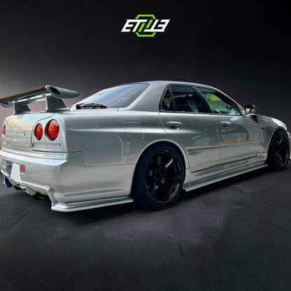 R34 GTR Nismo Style Rear Spats | SKU: R34-CF-28 | ID: 10658245116185 | Shopifydevstudio