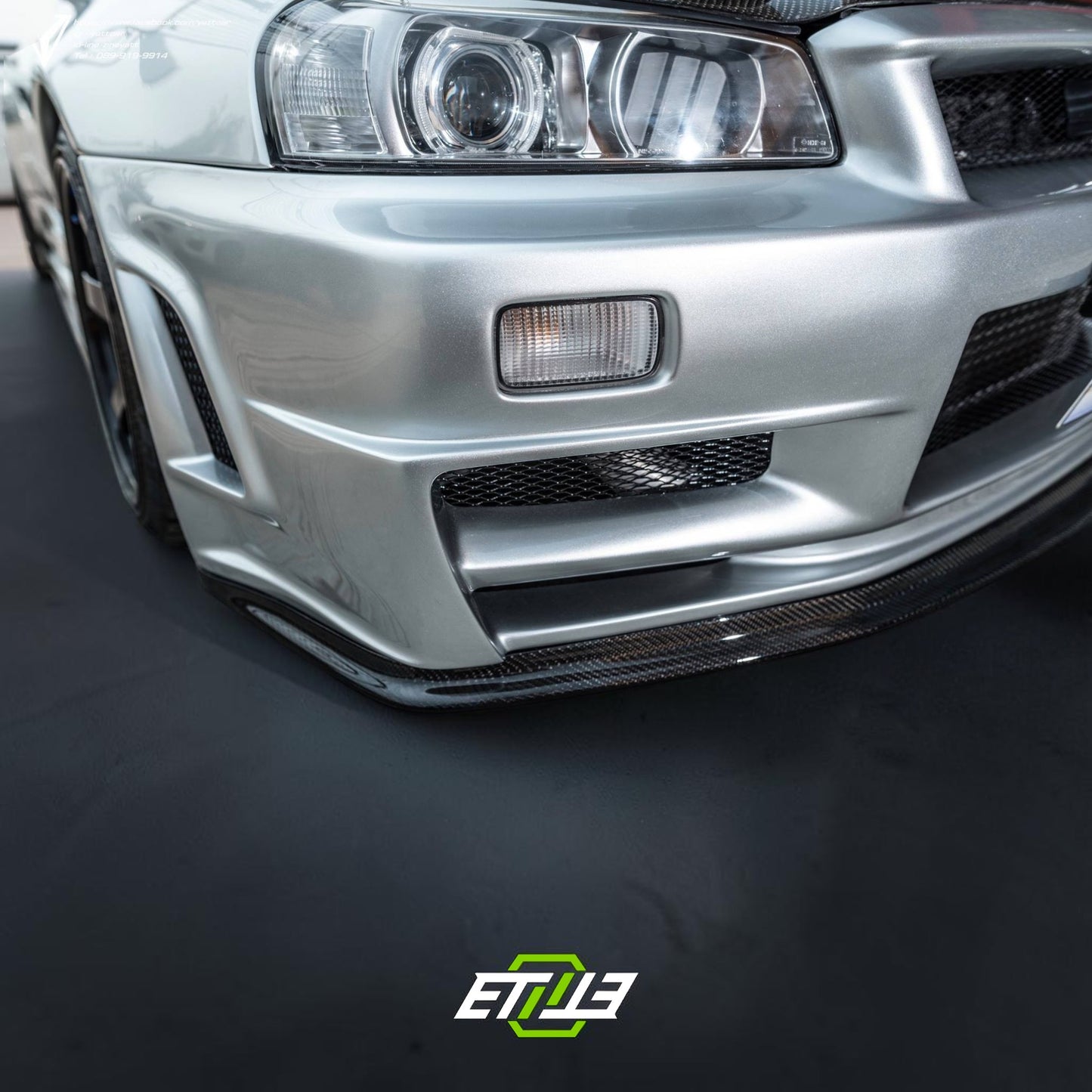 R34 GTR OEM Style Front Bumper Nismo Style Bottom Lip with Undertray | SKU: R34-CF-31 | ID: 10658245214489 | Shopifydevstudio