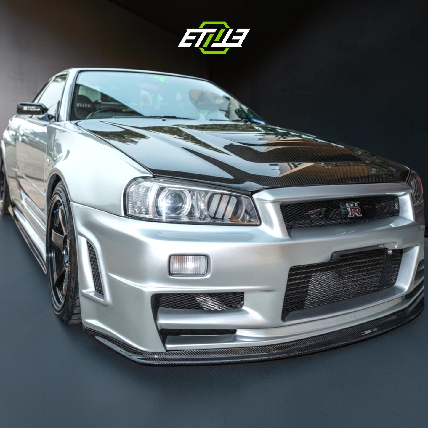 R34 GTT Z-Tune Front Bumper / Skyline R34 GTT 2D 4D GTR-Style Front Bumper | SKU: R34-CF-10 | ID: 10658244460825 | Shopifydevstudio