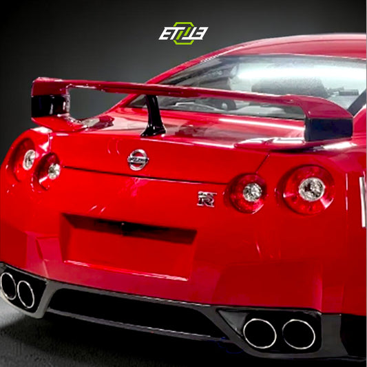 R35 higher-leg rear spoiler — bespoke carbon, rear view, ETi