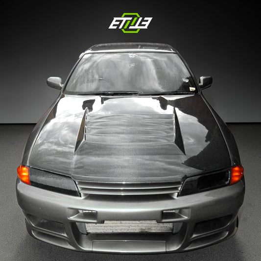 R32 Nismo style vented hood — carbon fiber, front view, ETi