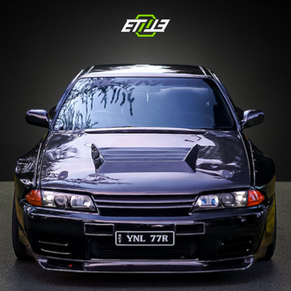 R32 Nismo style vented hood — carbon weave close-up, ETi