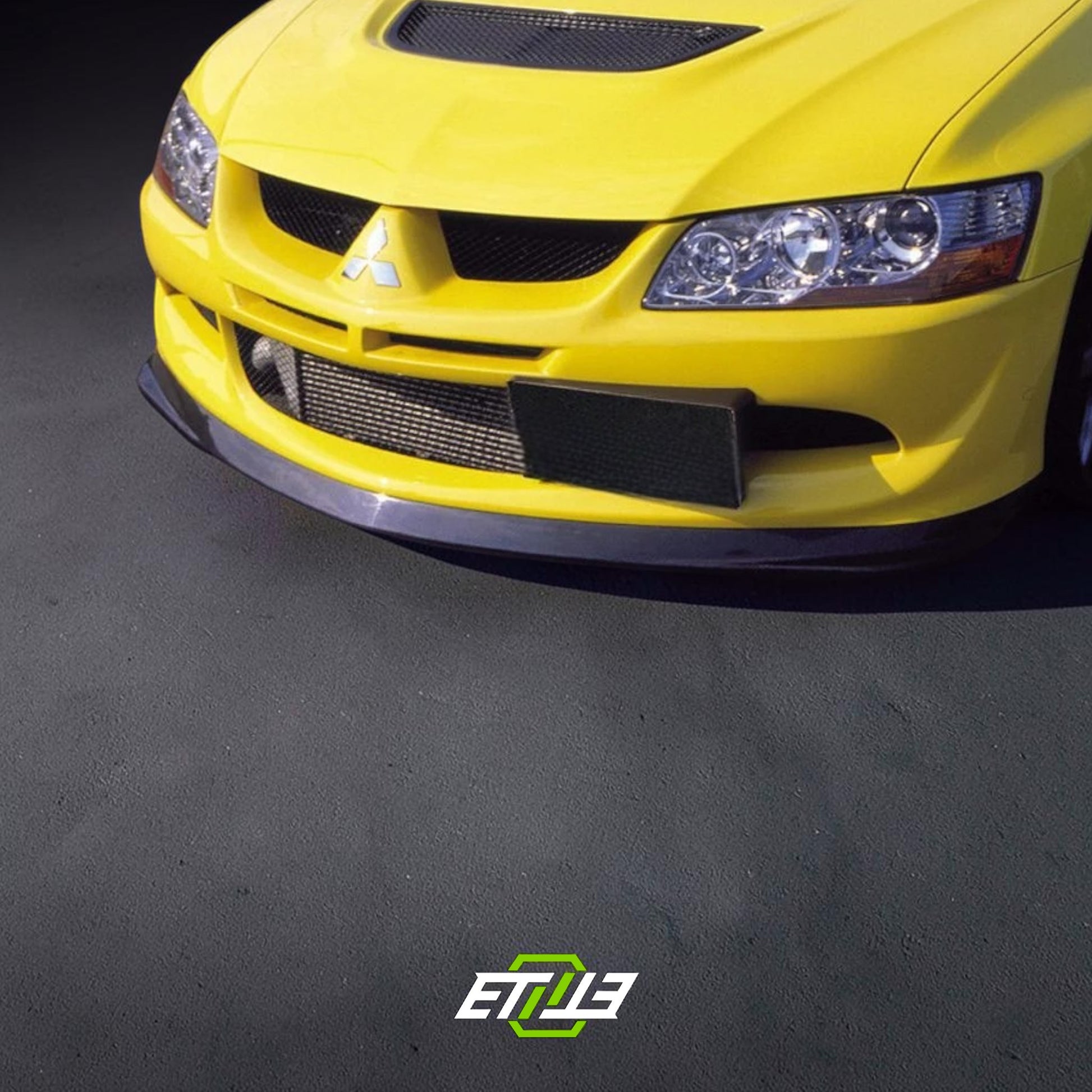 ETi Mitsubishi Evo 8Do-Luck D-Style Carbon Fiber Front Lip | Shopifydevstudio