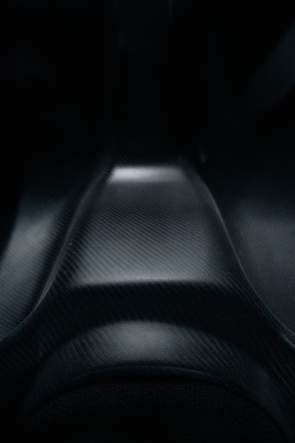 Detail view of Mazda RX-7 FD3S carbon rear seat delete surface and contours
