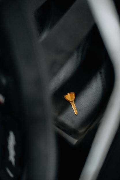 Mazda RX-7 FD3S carbon rear seat delete with titanium key detail