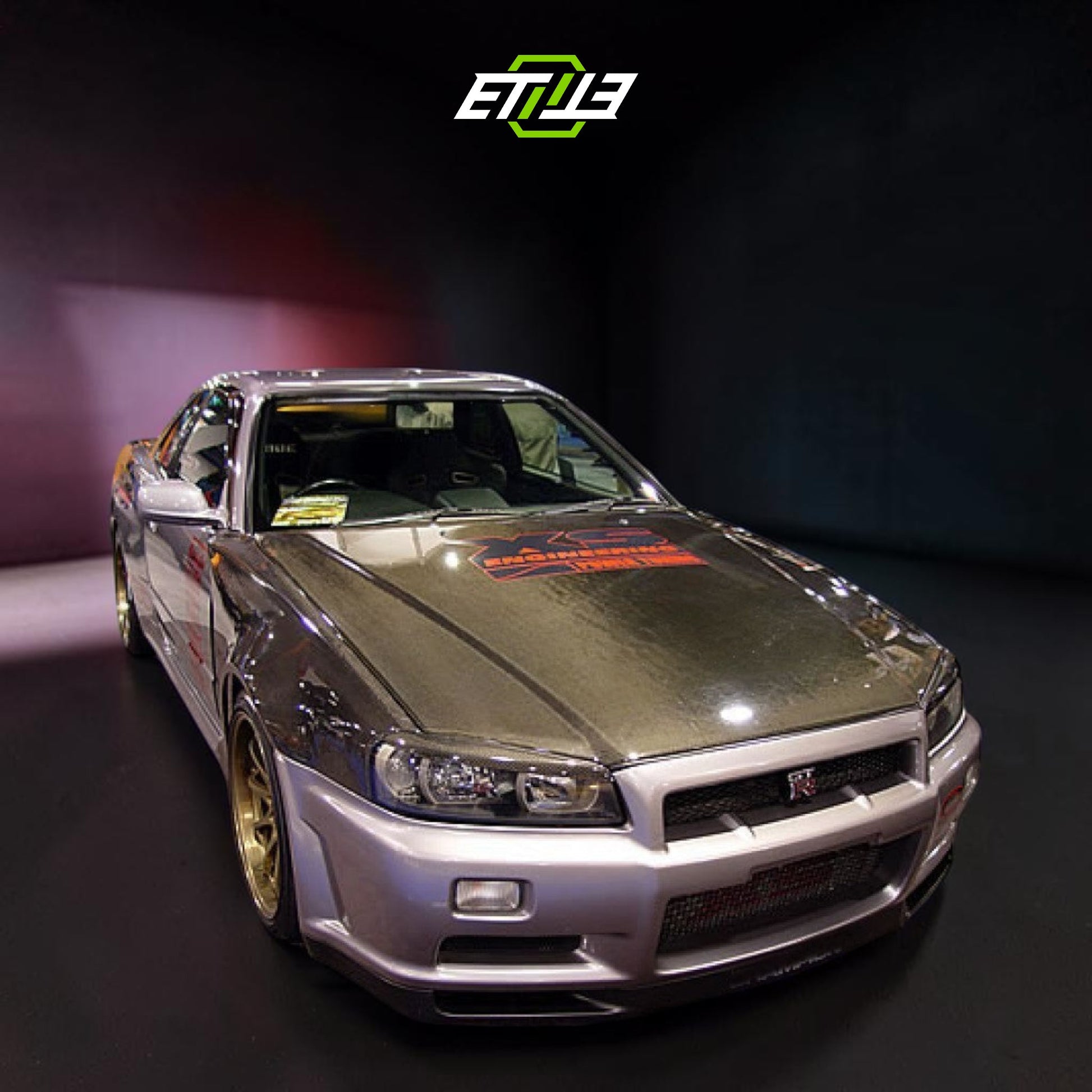 Nissan R34 GTR OEM Style Carbon Fiber Hood | SKU: ETI-HN00075-CF | ID: 10658249965849 | Shopifydevstudio