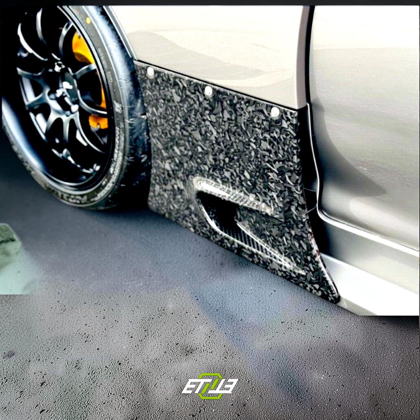RE-Amemiya GT side valence in forged carbon on an FD3S, the panel between the front fender flare and side skirt
